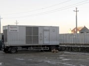 Генератор в контейнере, установленный на шасси Генератор в контейнере, установленный на шасси